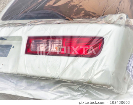 Rear bumper of a light wagon wrapped in vinyl 108430603