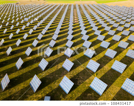 Photovoltaic solar panels at field, aerial photo 108431417