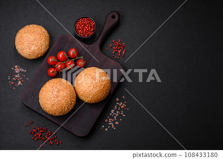 Delicious fresh crispy white round bread with seeds and grains 108433180