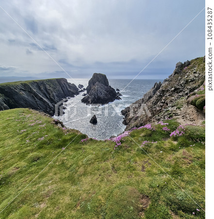 The sea cliffs and stacks at Malin Head. the Northern most point in Ireland 108435287