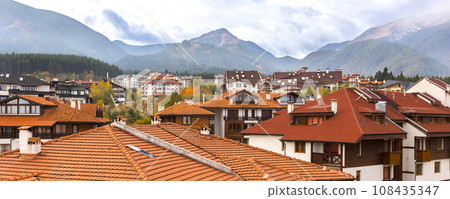 Bansko, Bulgaria houses and Pirin peaks, autumn 108435347
