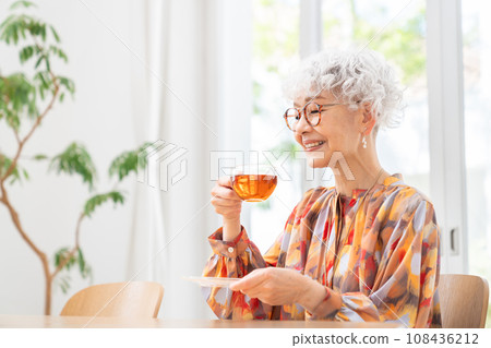 Senior woman drinking tea 108436212