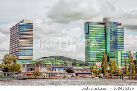modern Amsterdam city center, canals and bridges. modern Amsterdam city center, canals and bridges. 108436359