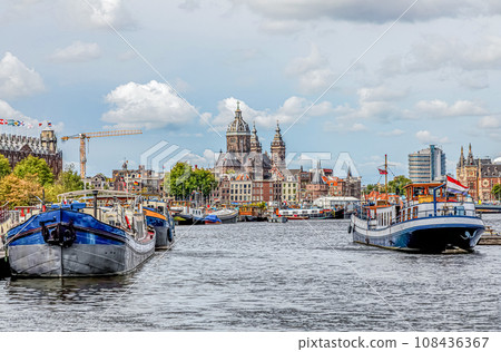 modern Amsterdam city center, canals and bridges. modern Amsterdam city center, canals and bridges. 108436367