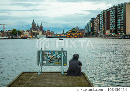 modern Amsterdam city center, canals and bridges. modern Amsterdam city center, canals and bridges. 108436414