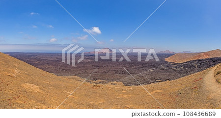Panoramic view over the barren volcanic Timanfaya National Park on Lanzarote Panoramic view over the barren volcanic Timanfaya National Park on Lanzarote 108436689