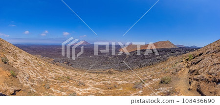 Panoramic view over the barren volcanic Timanfaya National Park on Lanzarote Panoramic view over the barren volcanic Timanfaya National Park on Lanzarote 108436690