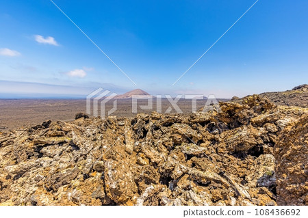 Panoramic view over the barren volcanic Timanfaya National Park on Lanzarote Panoramic view over the barren volcanic Timanfaya National Park on Lanzarote 108436692
