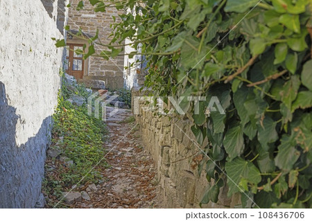 Picture from the town of Groznjan with idyllic cobbled streets and buildings made of natural stone Picture from the town of Groznjan with idyllic cobbled streets and buildings made of natural stone 108436706