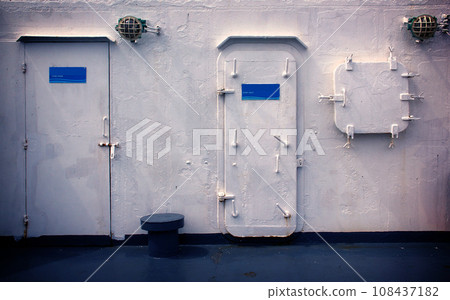 The exits Door of a Caribbean cruise ship and window in the blue sea. Abstract of banners concept.  108437182