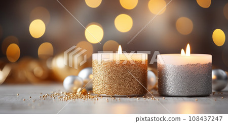 New Year and Christmas greetings banner. Gold and silver Christmas burning candles on background with bokeh New Year and Christmas greetings banner. Gold and silver Christmas burning candles on background with bokeh 108437247