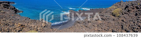 Panoramic picture over the black beach Playa del Paso near El Golfo on Lanzarote Panoramic picture over the black beach Playa del Paso near El Golfo on Lanzarote 108437639