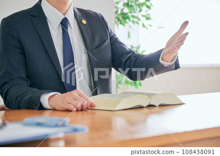 Male lawyer receiving legal advice Male lawyer receiving legal advice 108438091
