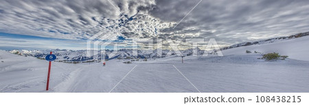Panoramic image of a ski slope in Ifen ski resort in Kleinwalsertal valley in Austria Panoramic image of a ski slope in Ifen ski resort in Kleinwalsertal valley in Austria 108438215