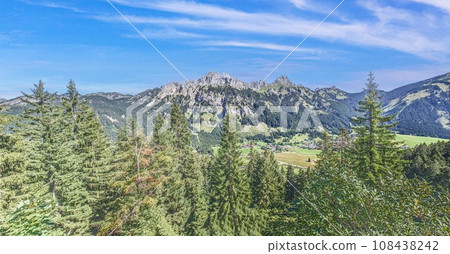 Panorama over the mountain massif Rote Flueh in the Austrian Tannheimer Tal from the Krinnenalpe Panorama over the mountain massif Rote Flueh in the Austrian Tannheimer Tal from the Krinnenalpe 108438242