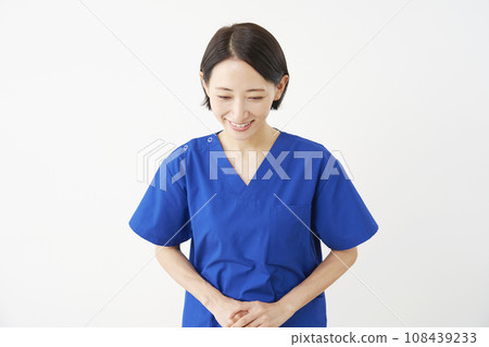 Female doctor bowing with a smile, white background 108439233