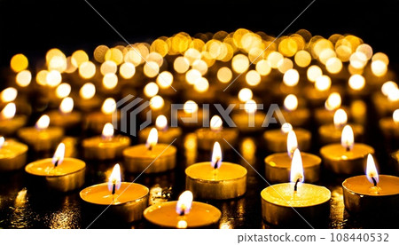 A large number of candles glowing in the dark_01_AI generated image 108440532