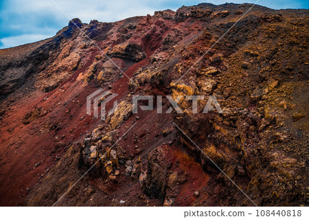 Amazing panoramic landscape of volcano in Timanfaya national park. Popular touristic in Lanzarote island Canary islans Spain. Artistic picture. Travel concept Amazing panoramic landscape of volcano in Timanfaya national park. Popular touristic in Lanzarote island Canary islans Spain. Artistic picture. Travel concept 108440818