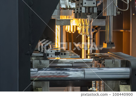 The drinking water bottle manufacturing process by blow mold machine. The drinking water bottle manufacturing process by blow mold machine. 108440900