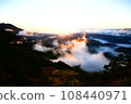 A sea of clouds burning in the morning sun 108440971