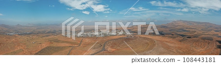 Drone panoramic view over Teguise town on Lanzarote from Santa Barbara Castle Drone panoramic view over Teguise town on Lanzarote from Santa Barbara Castle 108443181