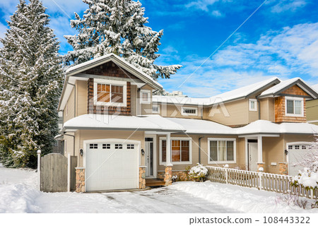 Entrance of residential duplex house on winter season in Canada. 108443322