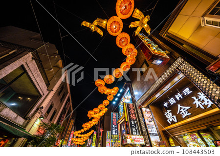 Yokohama cityscape in Japan 2024 Yokohama Chinatown with Chinese New Year lights. Dragon lanterns appear on Chinatown Boulevard = November 3rd 108443503