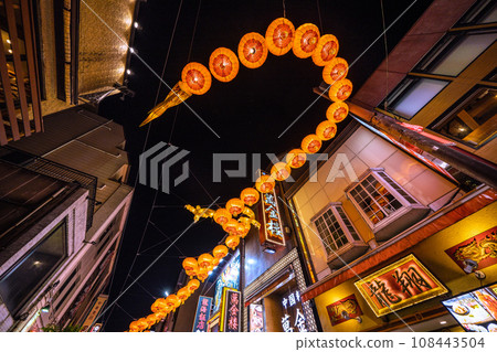 Yokohama cityscape in Japan 2024 Yokohama Chinatown with Chinese New Year lights. Dragon lanterns appear on Chinatown Boulevard = November 3rd 108443504