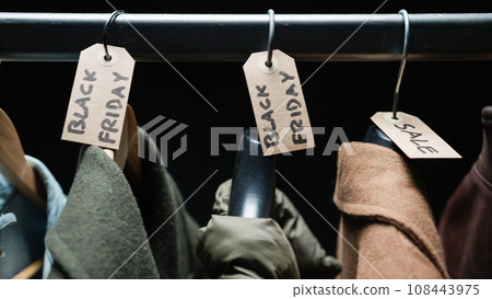 Clothes ready for Black Friday label sale background 108443975