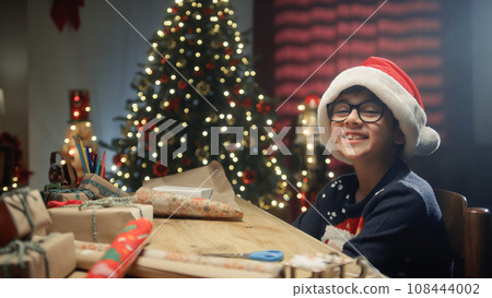 Kid Smile During Christmas Day On The Desk Kid Smile During Christmas Day On The Desk 108444002