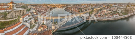 Drone panorama over the city of Porto and the Douro River at sunrise Drone panorama over the city of Porto and the Douro River at sunrise 108444508
