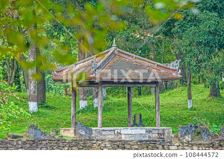 Image of a typical Asian resting place in an exotic garden in the Vietnamese city of Hue Image of a typical Asian resting place in an exotic garden in the Vietnamese city of Hue 108444572