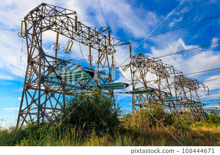 High voltage power line against blue sky High voltage power line against blue sky 108444671