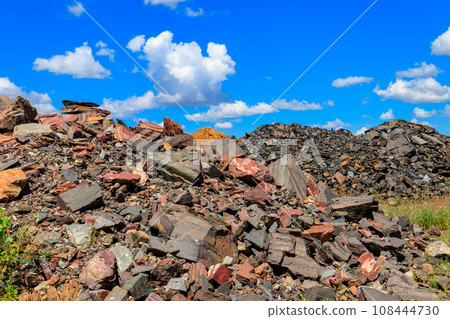 Large heap of stones near the iron ore quarry Large heap of stones near the iron ore quarry 108444730
