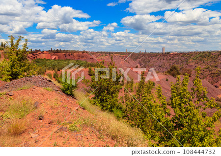 View of huge iron ore quarry in Kryvyi Rih, Ukraine. Open pit mining View of huge iron ore quarry in Kryvyi Rih, Ukraine. Open pit mining 108444732