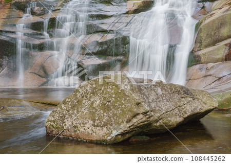 Mumlava waterfall, in the foreground granite stone. Mountain river Mumlava, Krkonose national park, Czech Republic, Mumlava waterfall, in the foreground granite stone. Mountain river Mumlava, Krkonose national park, Czech Republic, 108445262