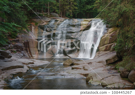 Mumlava waterfall. Mountain river Mumlava, Krkonose national park, Czech Republic, summer afternoon. Mumlava waterfall. Mountain river Mumlava, Krkonose national park, Czech Republic, summer afternoon. 108445267