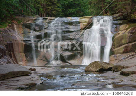 Mumlava waterfall. Mountain river Mumlava, Krkonose national park, Czech Republic, summer afternoon. Mumlava waterfall. Mountain river Mumlava, Krkonose national park, Czech Republic, summer afternoon. 108445268