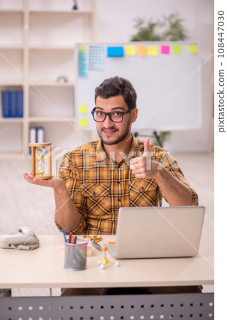 Young male designer working in the office 108447030