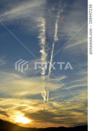 A cloud that stains in the sunset A cloud that stains in the sunset 108447236