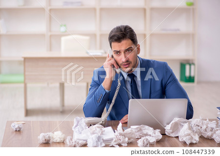 Young male employee in brainstorming concept Young male employee in brainstorming concept 108447339