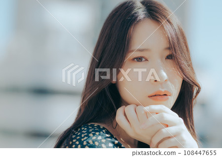 woman standing on the roof woman standing on the roof 108447655