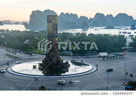 Intersection with clock tower in Ha Long city, Vietnam and morning at Ha Long Bay Intersection with clock tower in Ha Long city, Vietnam and morning at Ha Long Bay 108448347