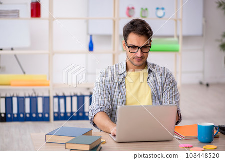 Young male freelancer working from home 108448520