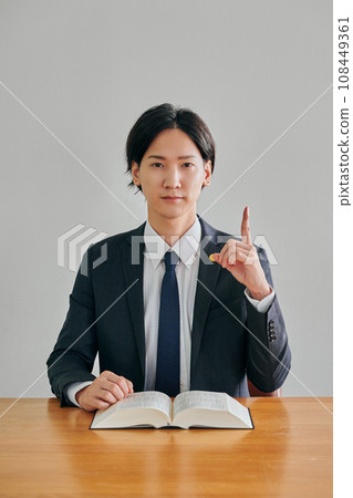 Male lawyer receiving legal advice and giving advice 108449361