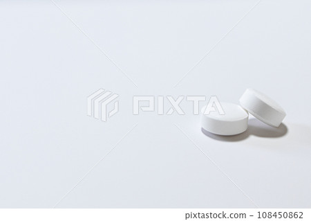 Medicine: Close-up of white pills 108450862