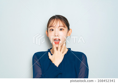 A woman with a surprised expression 108452341