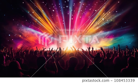 silhouette of concert crowd in front of bright stage lights 108453339