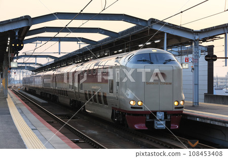 Limited Express Sunrise Izumo waiting for departure at Izumo City Station at dusk 108453408
