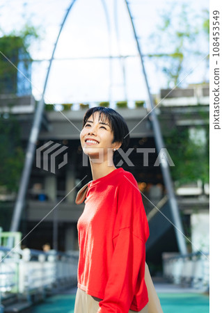 Women walking in the city, shopping, tourists Women walking in the city, shopping, tourists 108453549